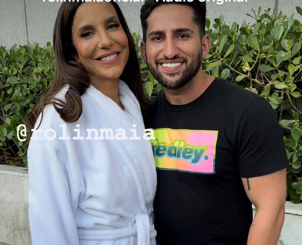 Ivete Sangalo atende fãs usando roupão de banho em aeroporto