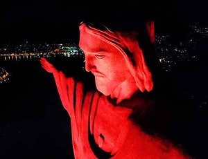 Cristo Redentor laranja e festa pela cidade no Dia do Gari